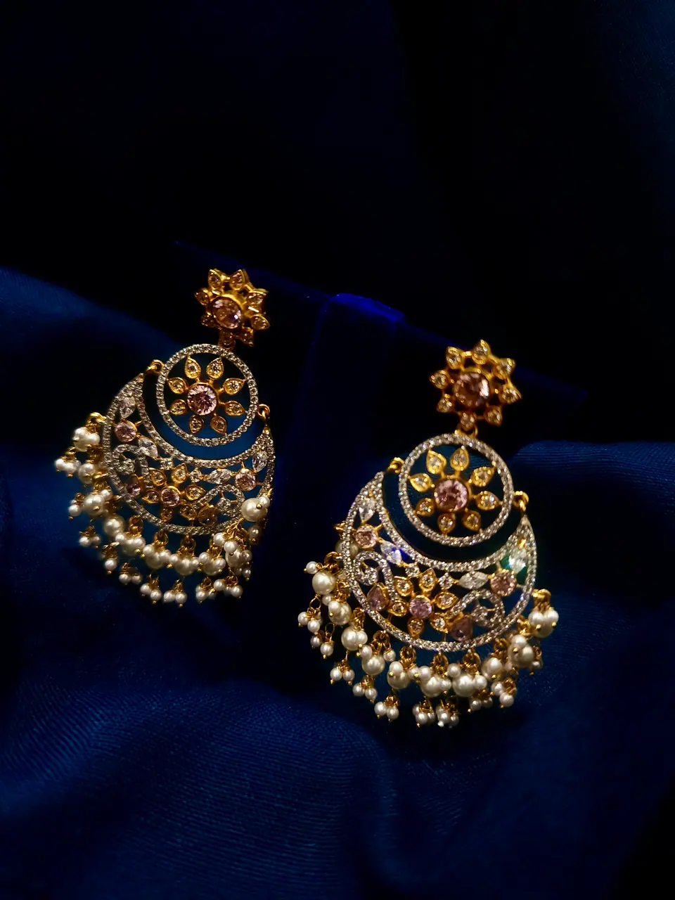 Pair of gold chandbali earrings with blue enamel and pearl drops